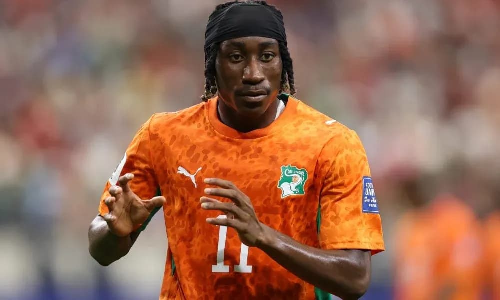 Player in orange jersey preparing for match