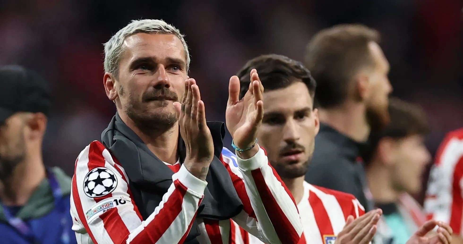 Players applauding fans after the match