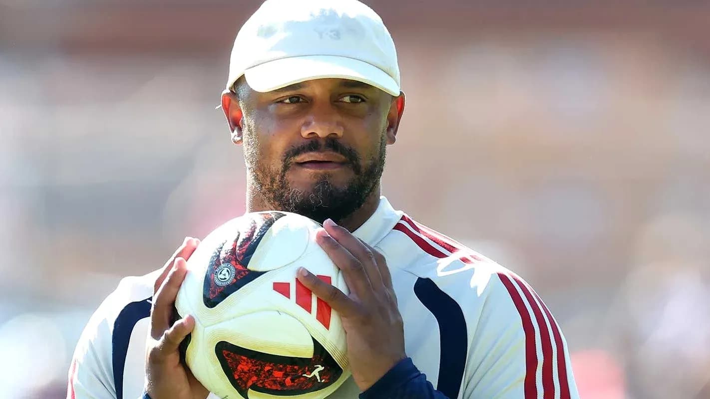 Player holding a soccer ball during training session