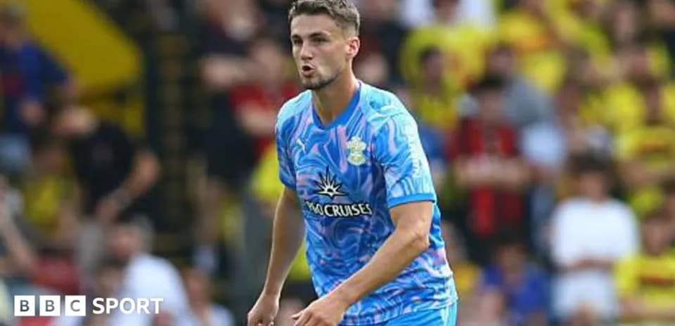 Player in blue jersey during match action