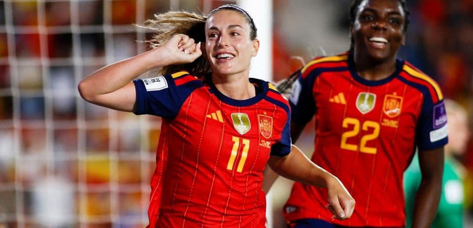 Spain players celebrating a goal during a match