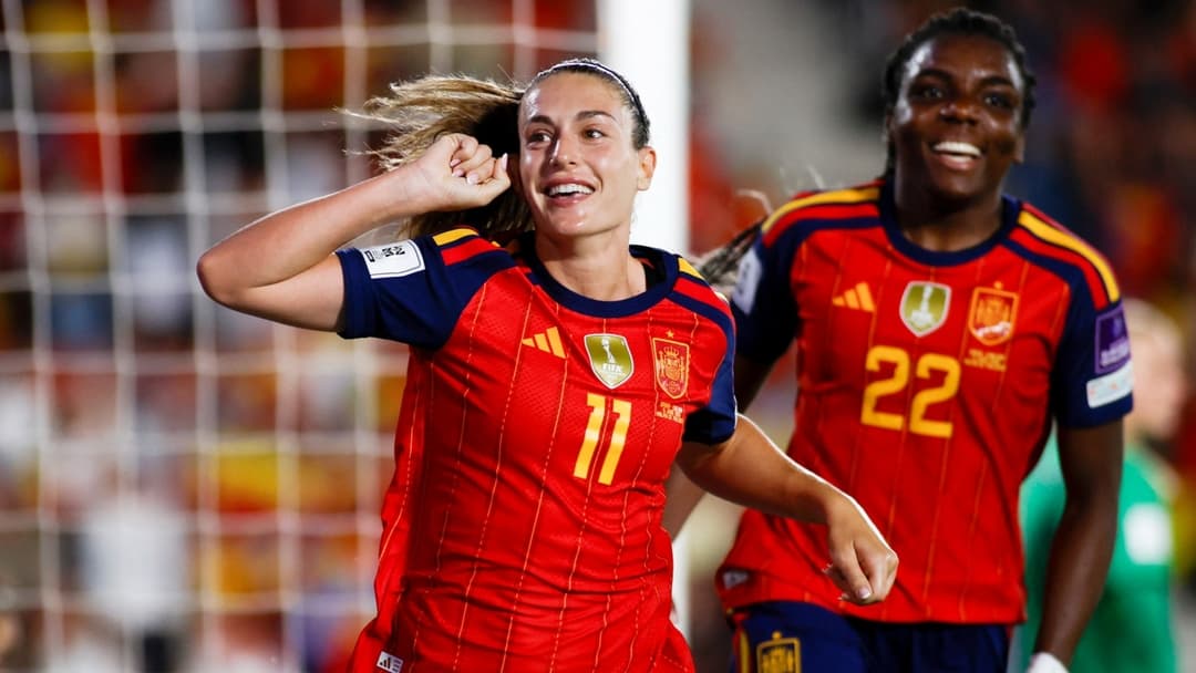 Spain players celebrating a goal during a match