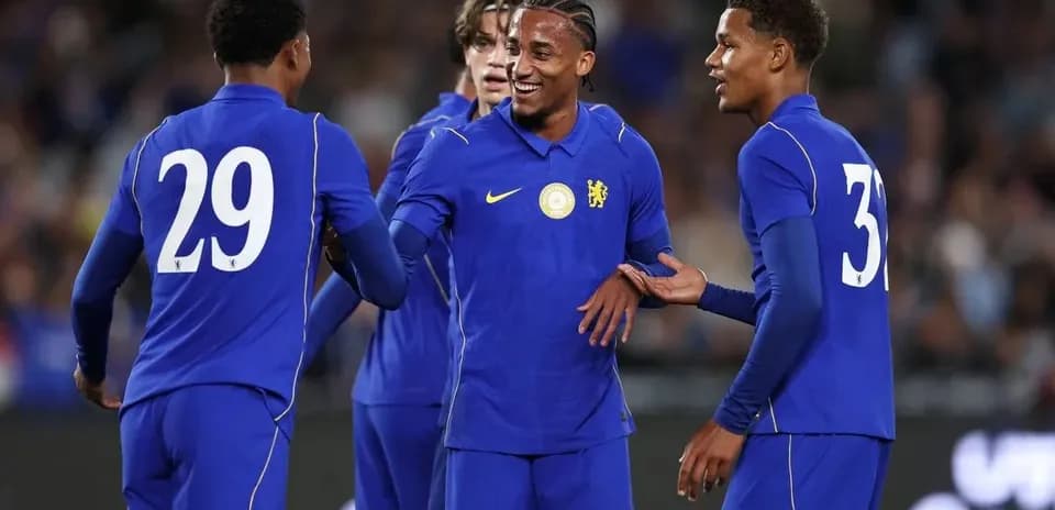 Chelsea players celebrating together on the pitch