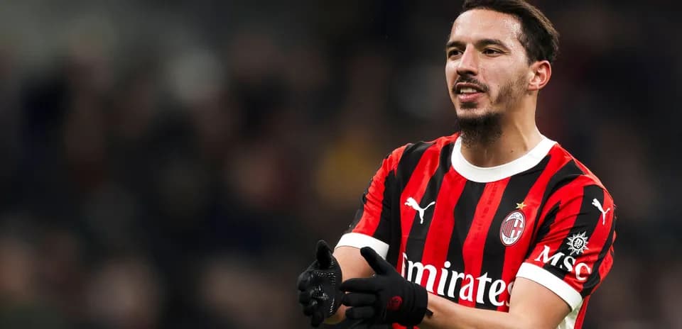 AC Milan player gesturing during match