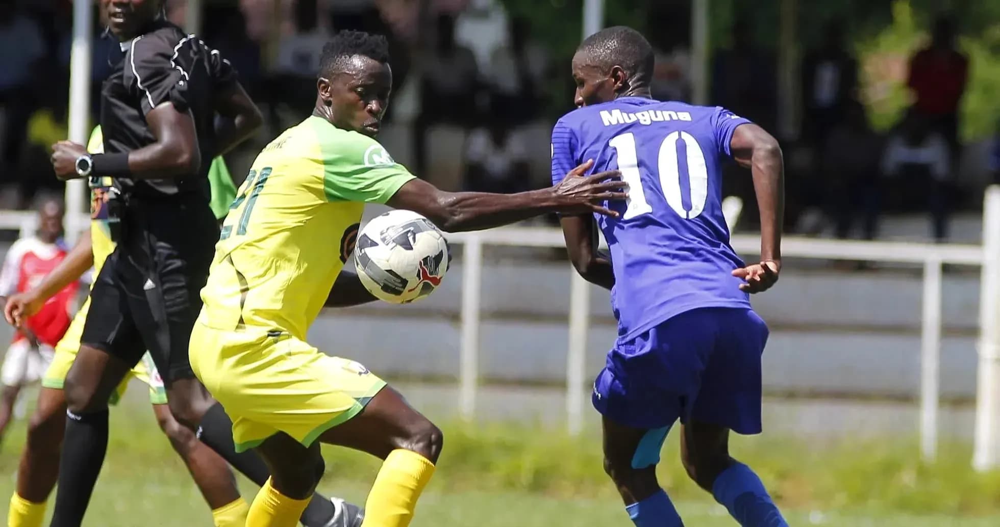 Mathare United player challenging Bandari player