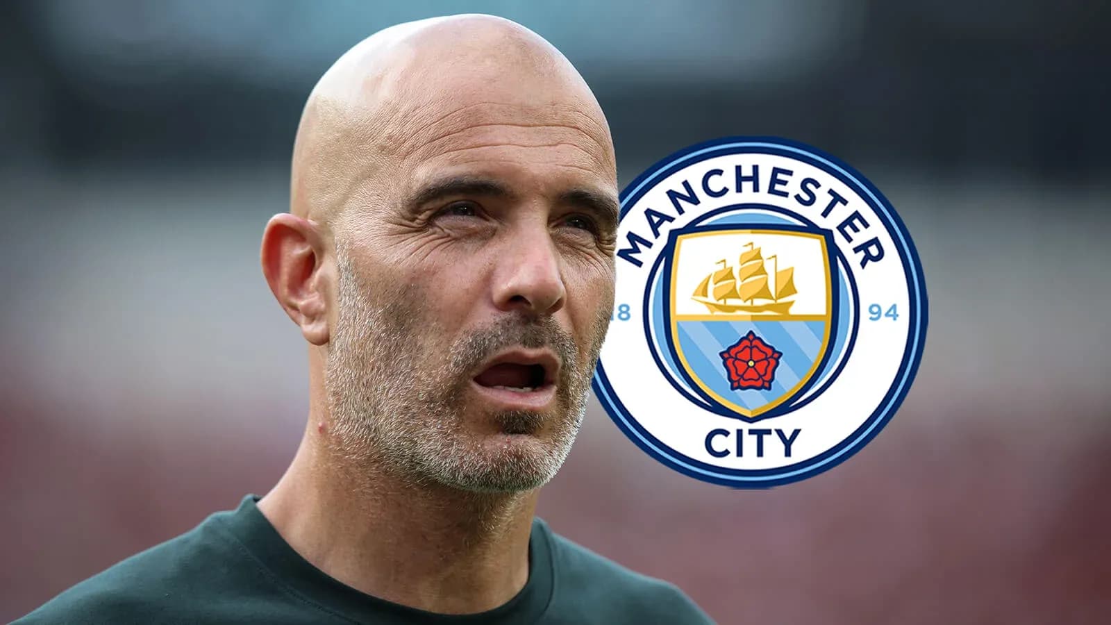 Coach in front of Manchester City logo