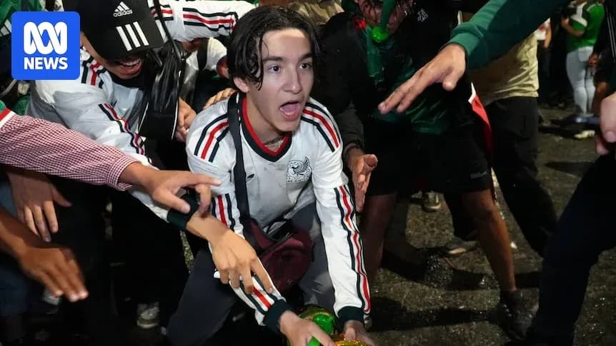 Fans celebrating with excitement during a sports event