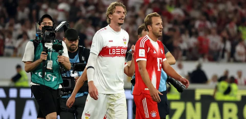 Players from Stuttgart and Bayern walking off the pitch