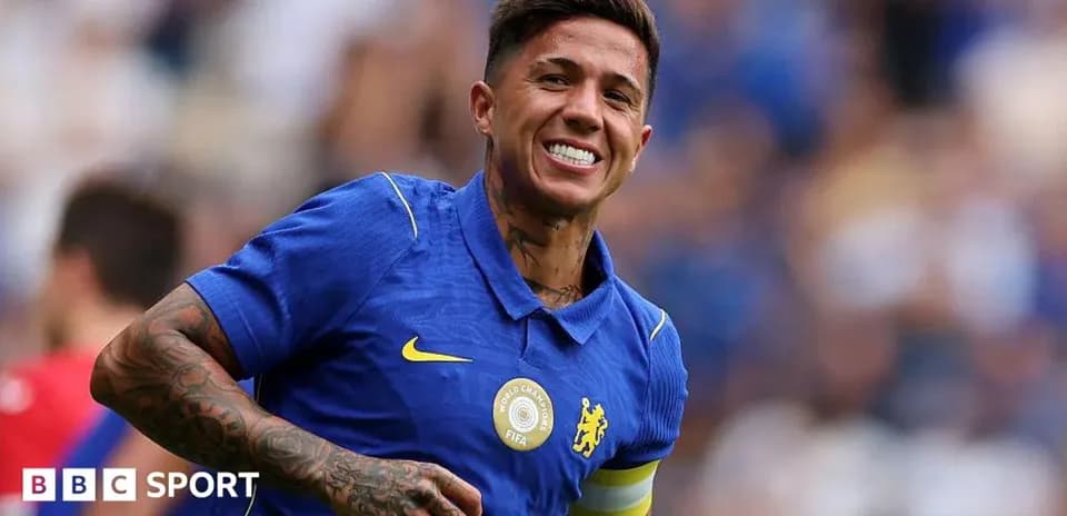 Player celebrating in blue Chelsea kit during match