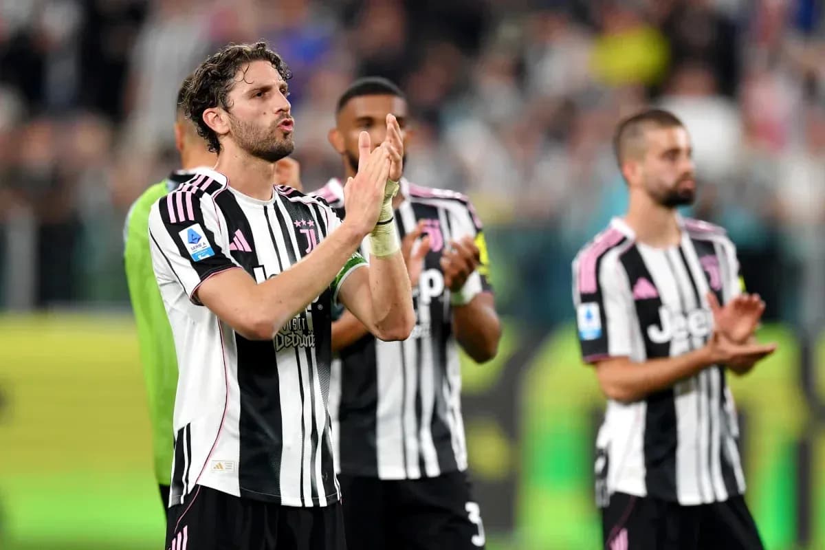 Juventus players applauding fans after a match