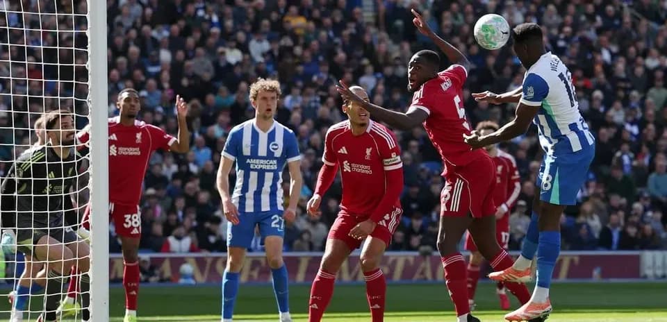 Players contesting for the ball during match