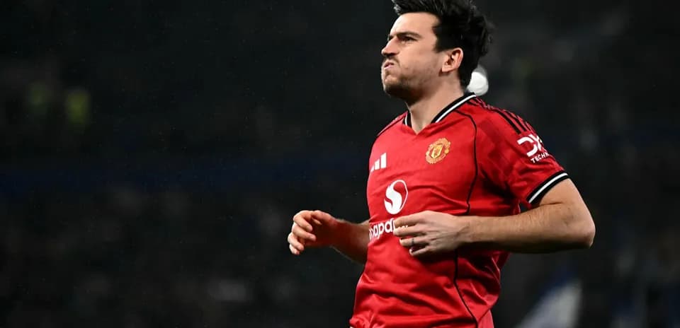 Player celebrating in Manchester United jersey