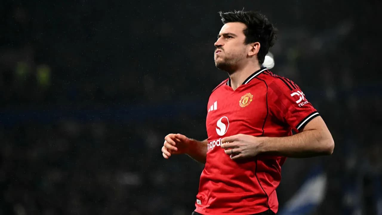 Player celebrating in Manchester United jersey