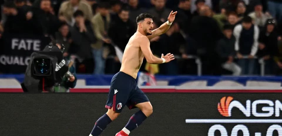 Bologna player celebrating after scoring goal