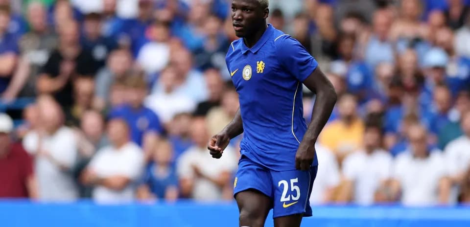 Chelsea player running on the pitch during match