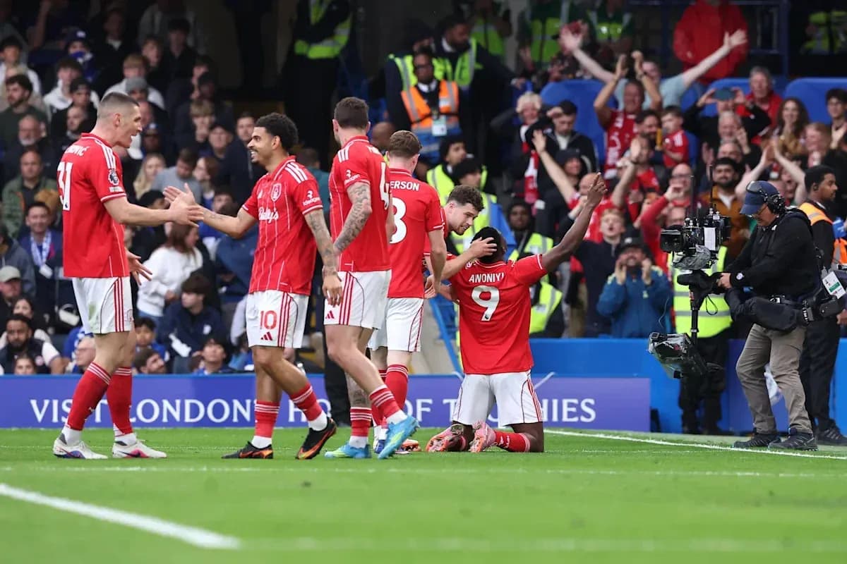 Players celebrating a goal on the pitch