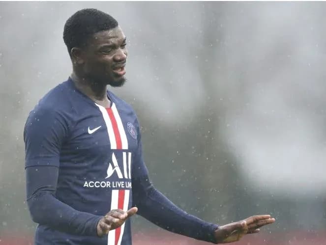 Player gesturing during rainy training session