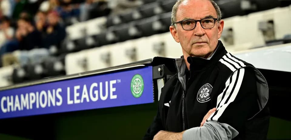Coach observing during UEFA Champions League match
