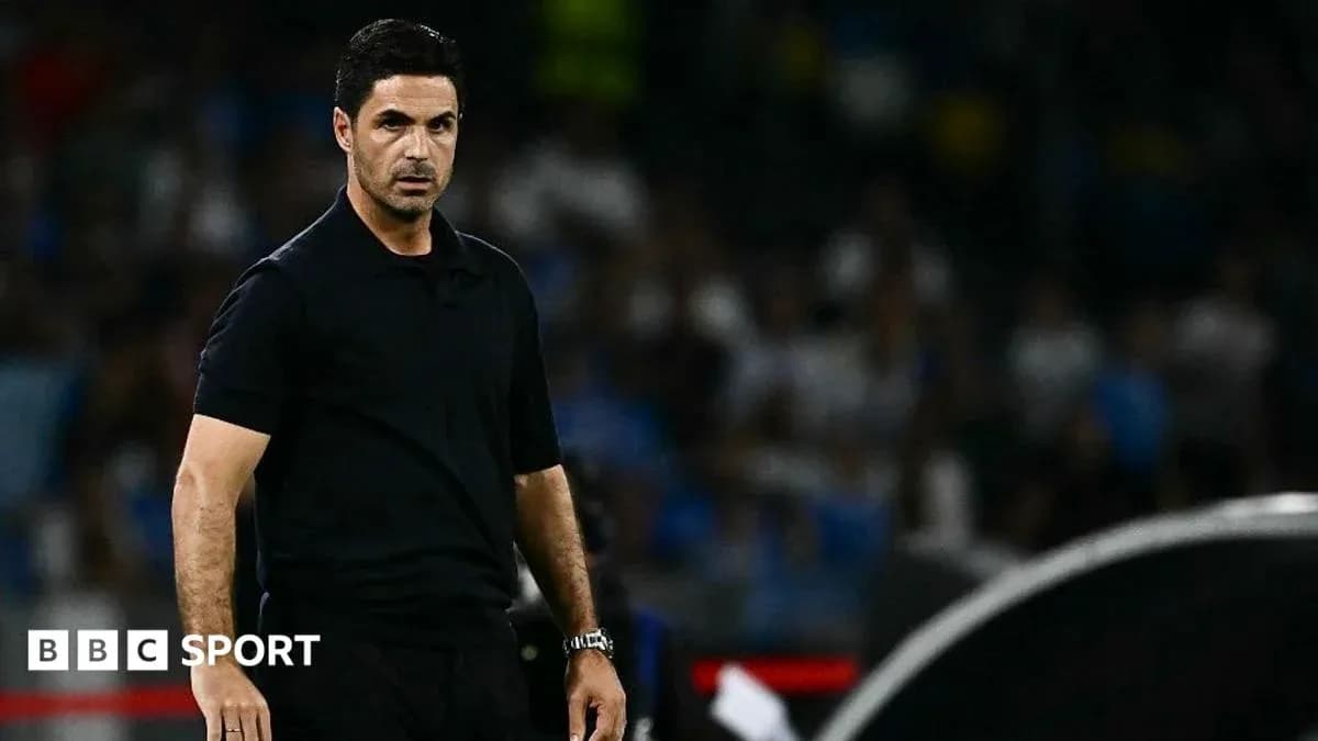 Coach observing the match from the sideline