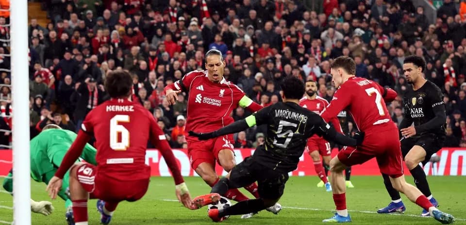 Liverpool players contesting a goal against PSG