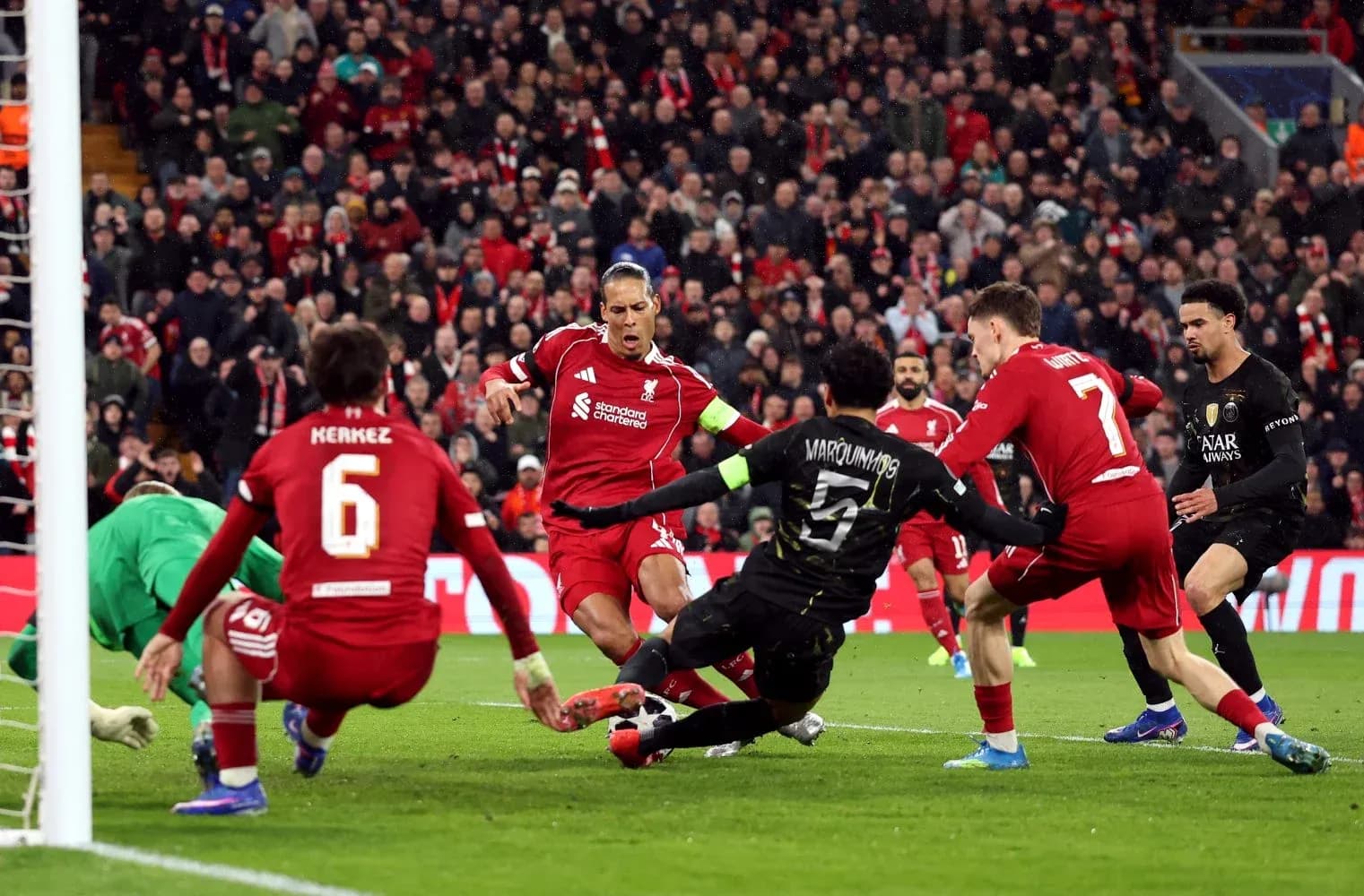 Liverpool players contesting a goal against PSG