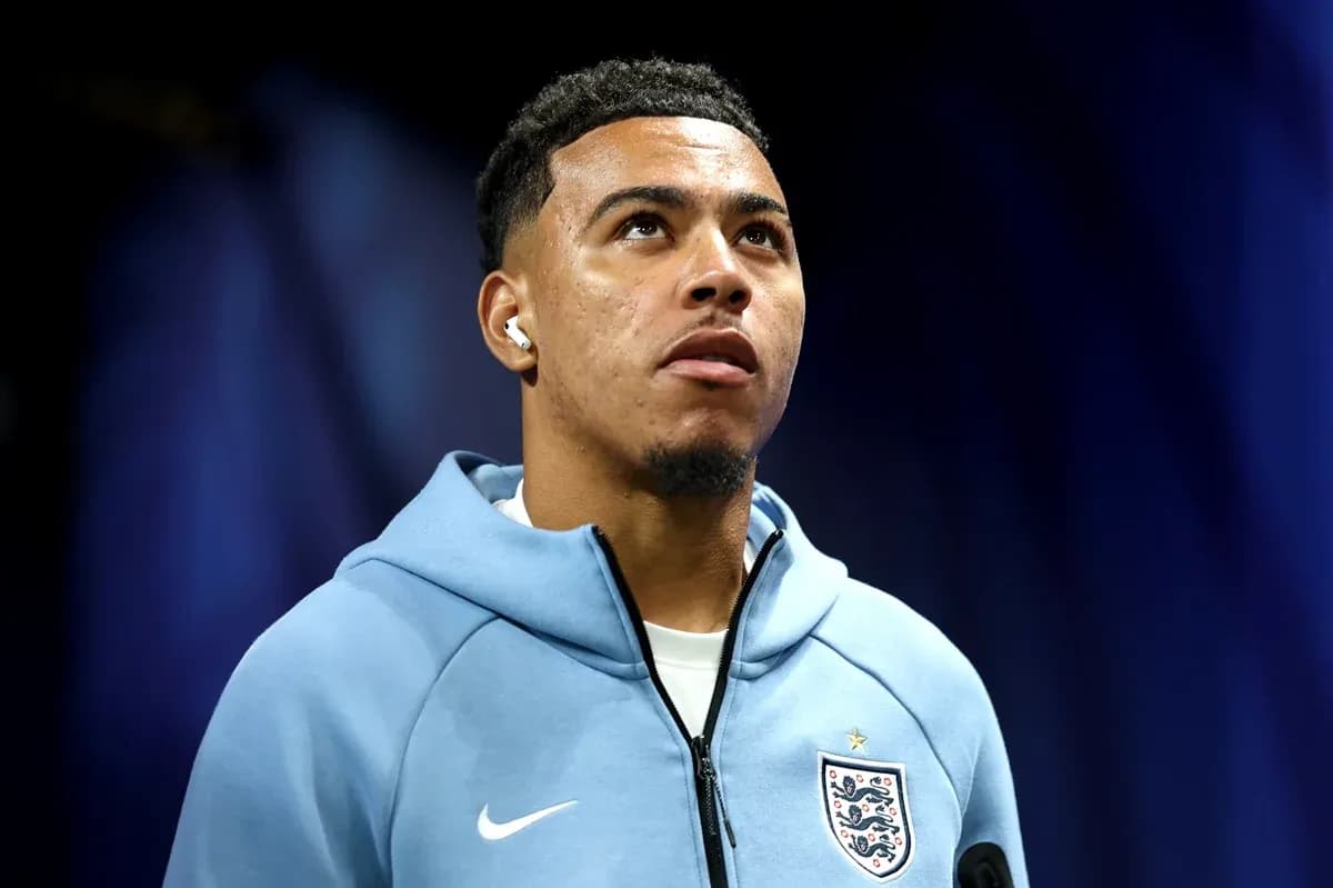 Player wearing England kit during press event