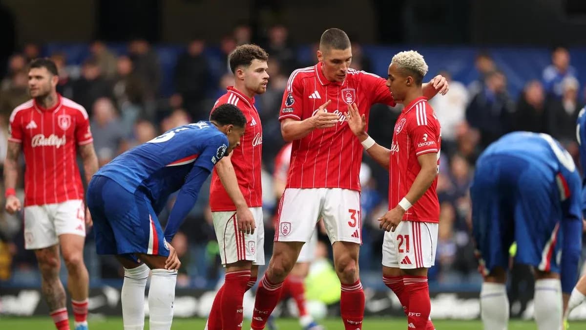 Players discussing during match on the field