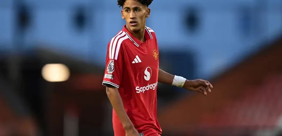 Player in Manchester United jersey on the field