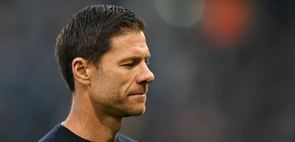 Coach looking thoughtful during a match