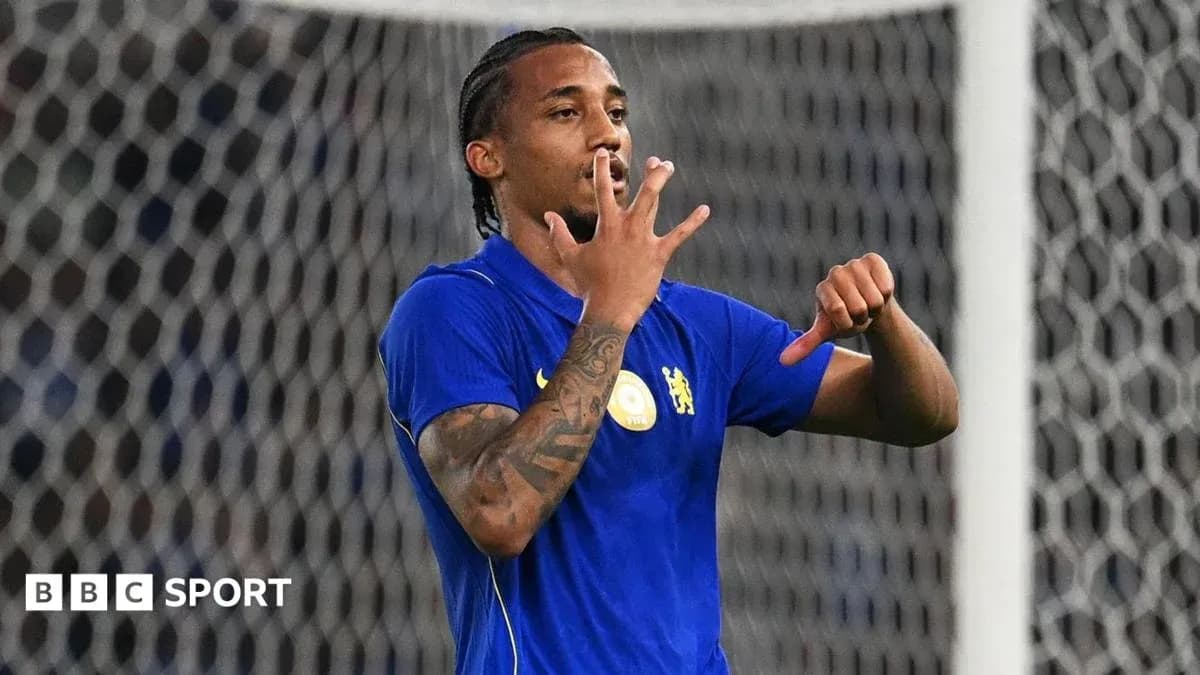 Player celebrating a goal with hand gesture