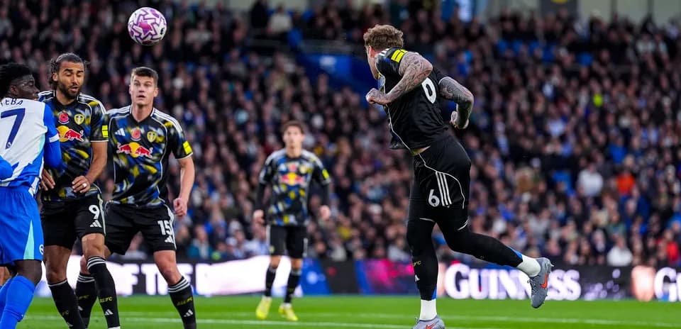 Leeds goalkeeper attempting to catch a high ball