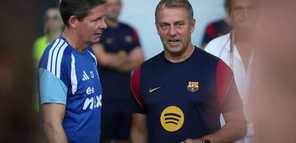Coaches conversing during a training session