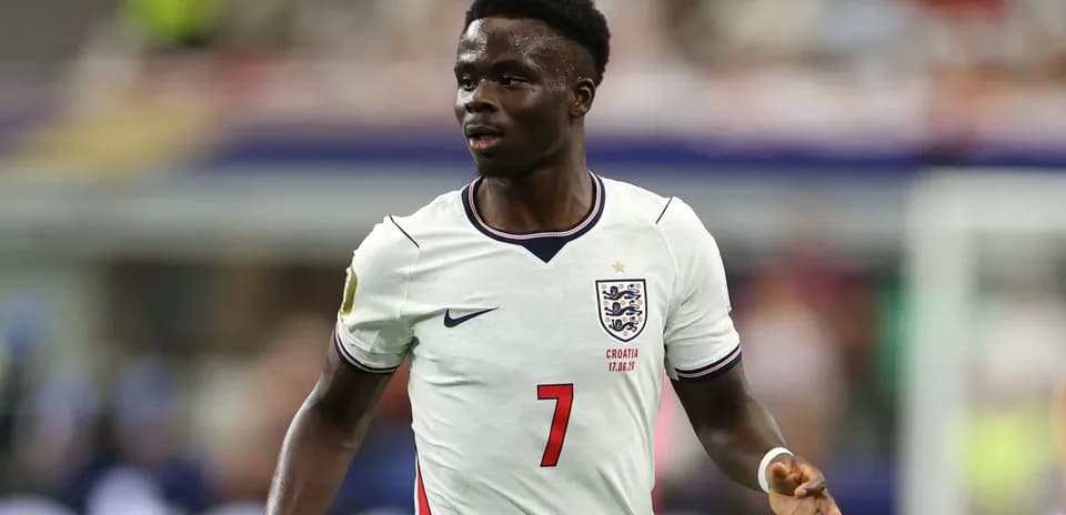 Player wearing England jersey during match action