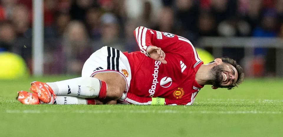 Player on ground after falling during match