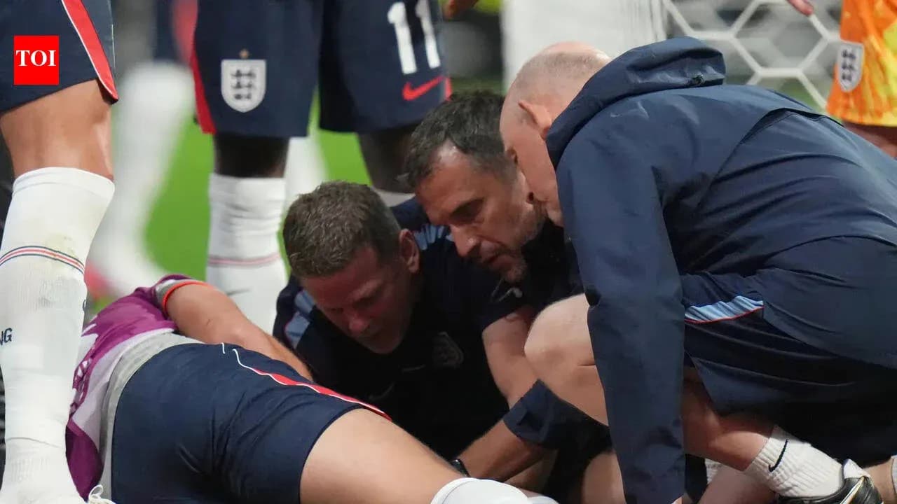 Medical staff attending to injured player on field