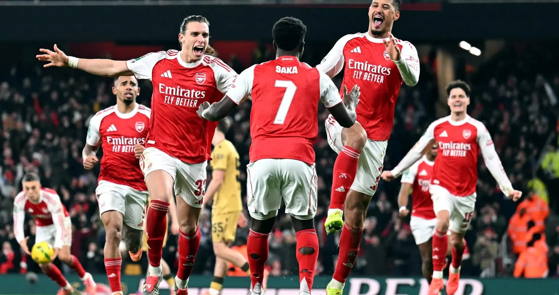 Arsenal players celebrating goal during match