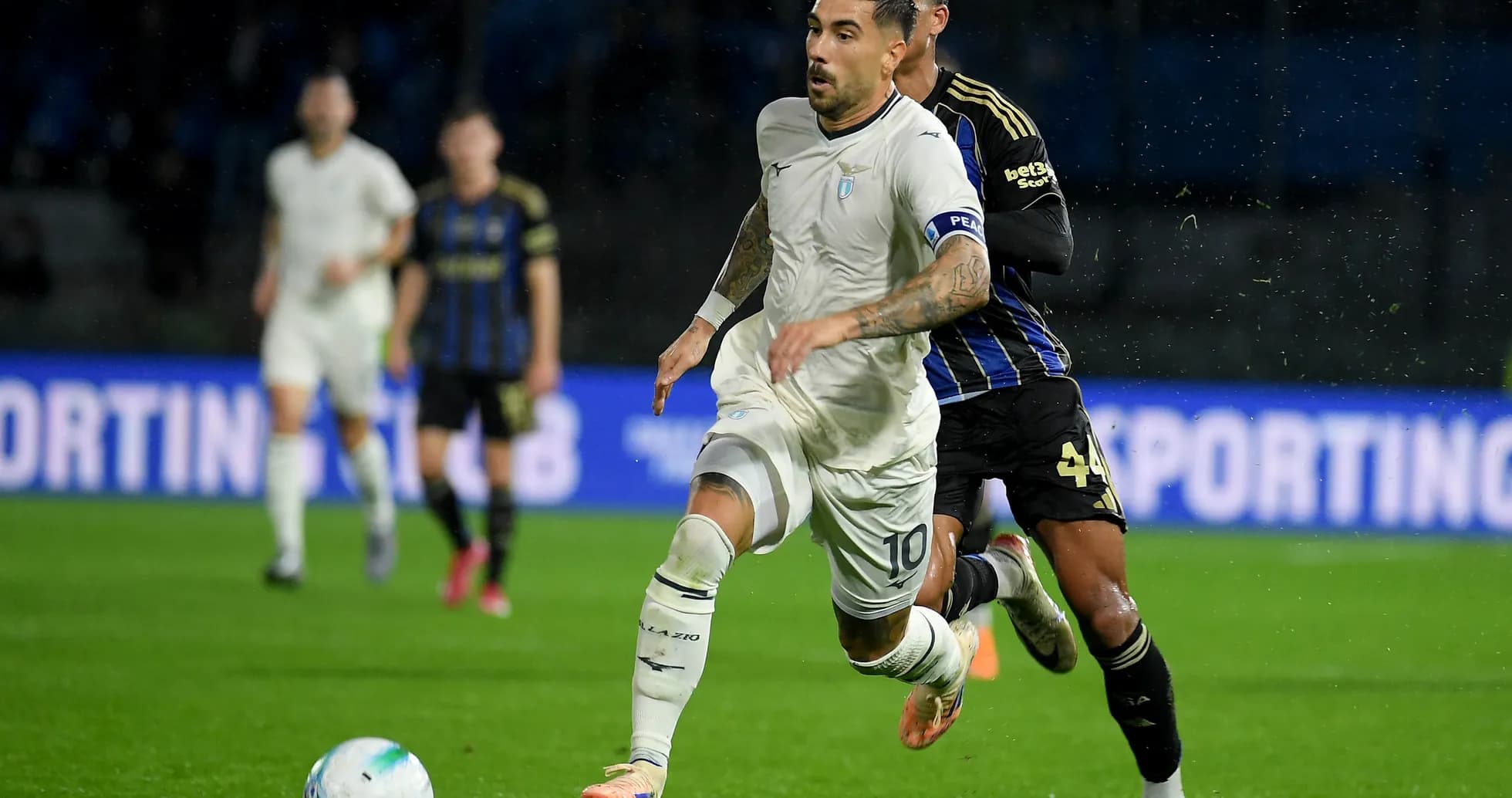 Lazio player sprinting during match against Pisa