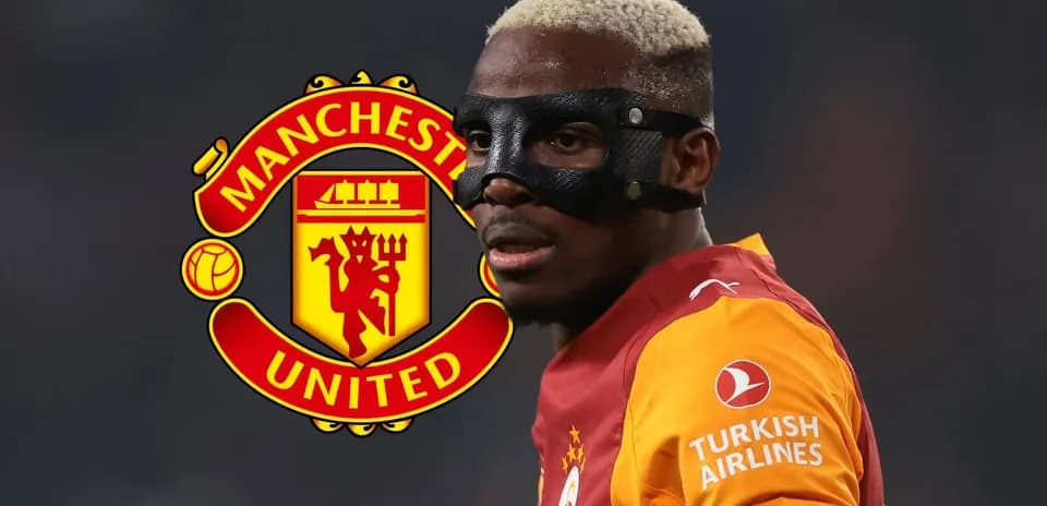 Player wearing mask in front of Manchester United logo