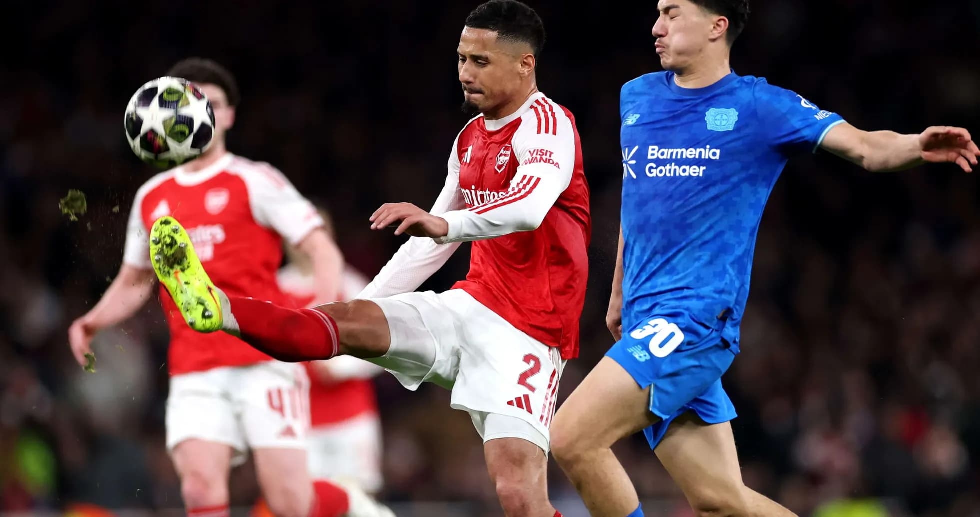 Arsenal player kicking the ball against Leverkusen