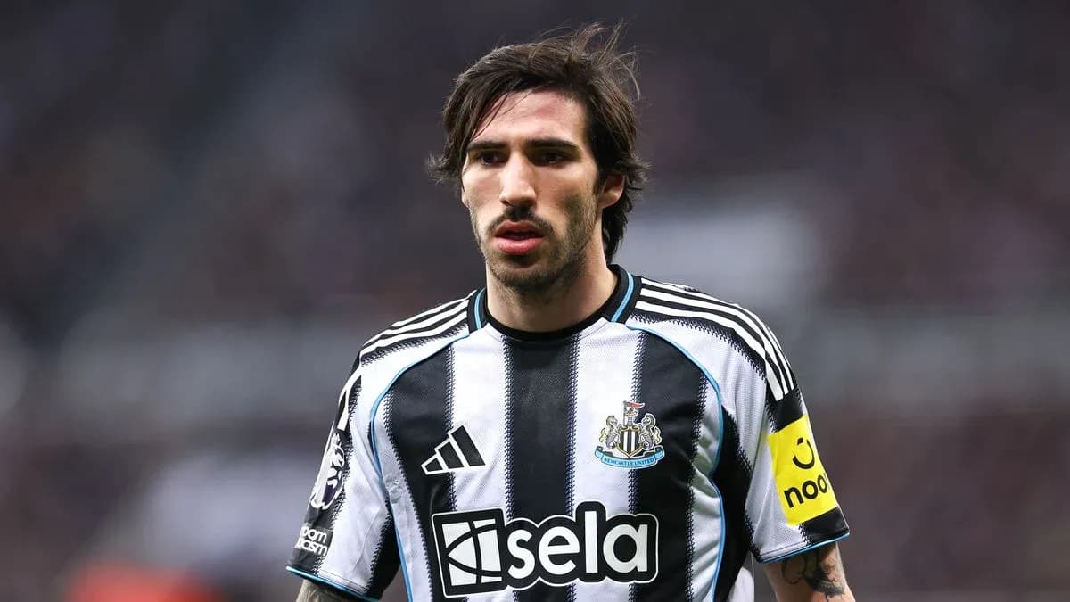 Player wearing Newcastle United jersey on the field