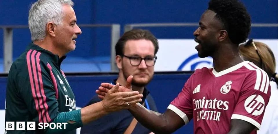 Manager and player shaking hands after match