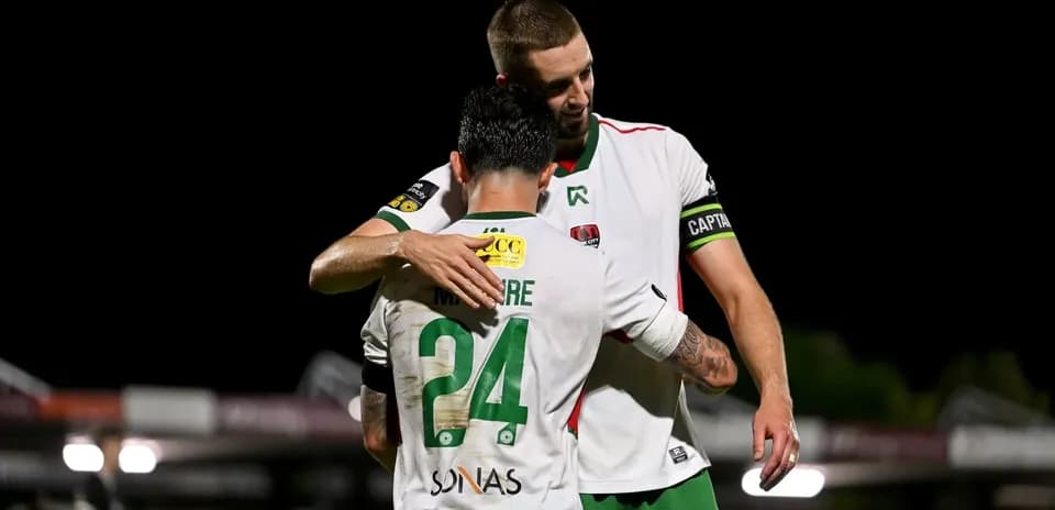 Two players embracing after a match