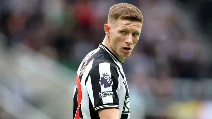 Newcastle player looking back during match