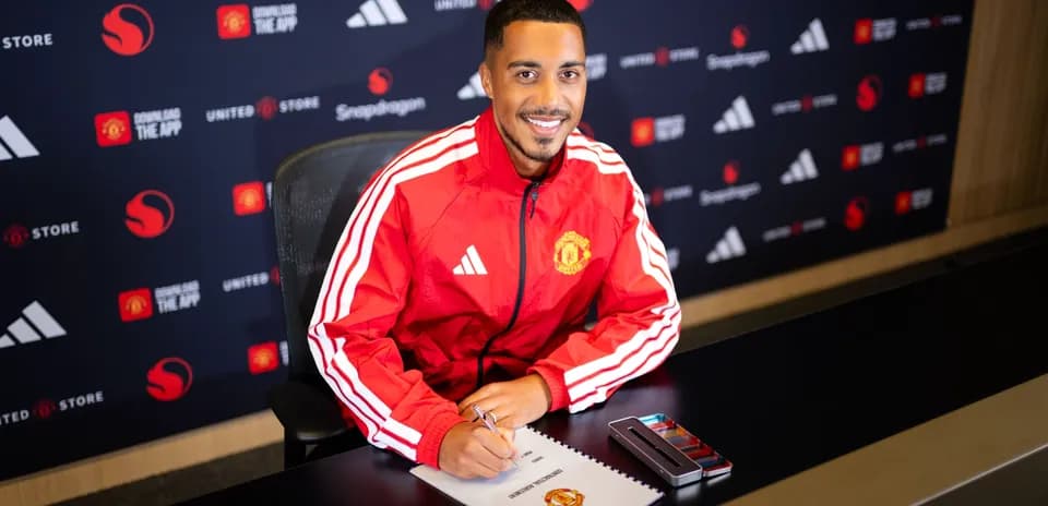 Player signing contract at Manchester United announcement