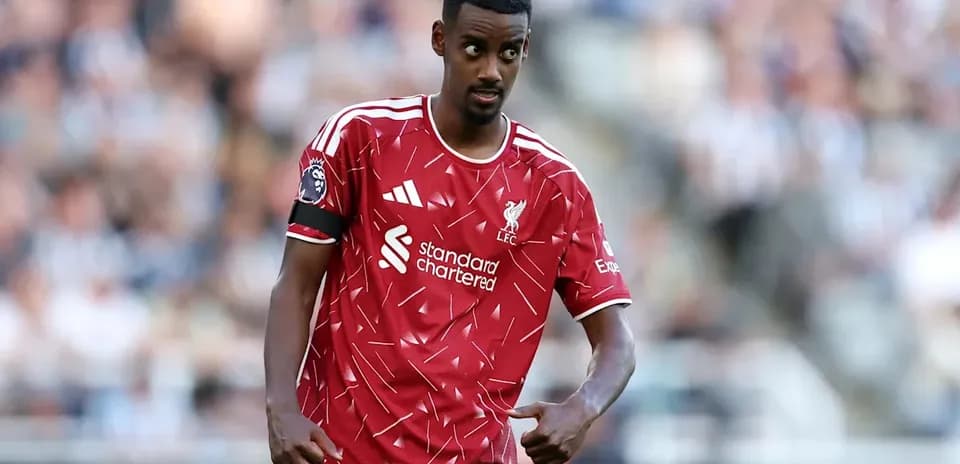 Liverpool player gesturing during a match