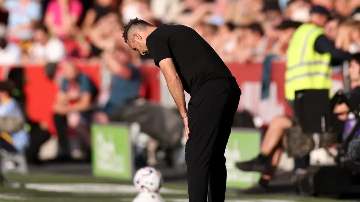 Coach observing the game from the sidelines