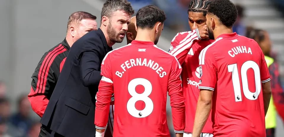 Manager discussing strategy with players during match