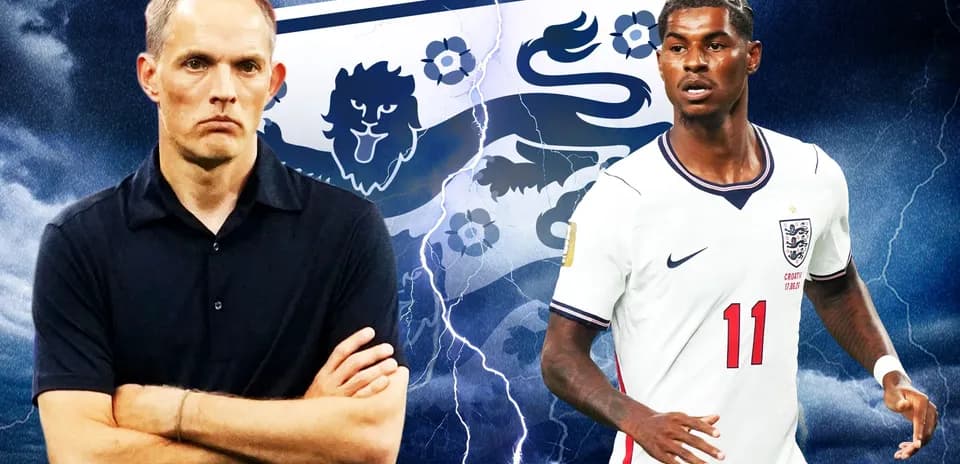 Coach and player in front of England team logo