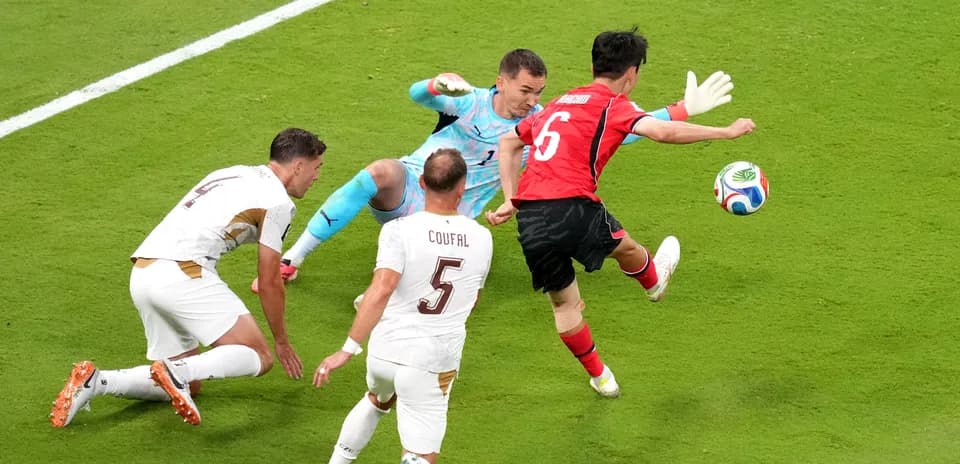 South Korea player shoots at goal against Czech Republic
