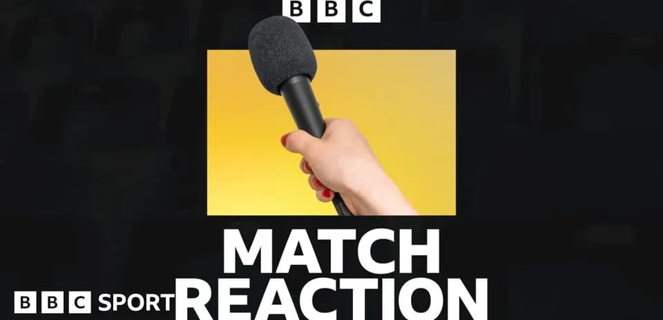 Hand holding a microphone with match reaction text